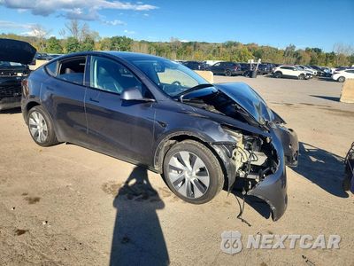 Czwarte zdjęcie samochodu z boku: 2023 TESLA MODEL Y VIN:7SAYGDEE7PA209760 - miniatura