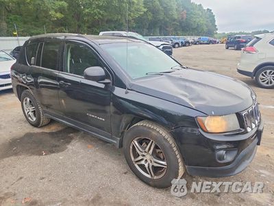 Czwarte zdjęcie samochodu z boku: 2014 JEEP COMPASS SPORT VIN:1C4NJCBAXED620588 - miniatura