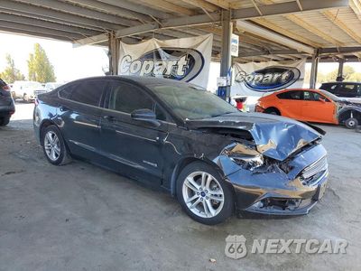 Czwarte zdjęcie samochodu z boku: 2018 FORD FUSION SE HYBRID VIN:3FA6P0LU2JR206934 - miniatura