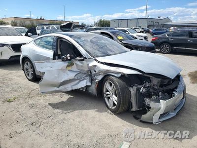 Czwarte zdjęcie samochodu z boku: 2014 TESLA MODEL S VIN:5YJSA1H17EFP49931 - miniatura
