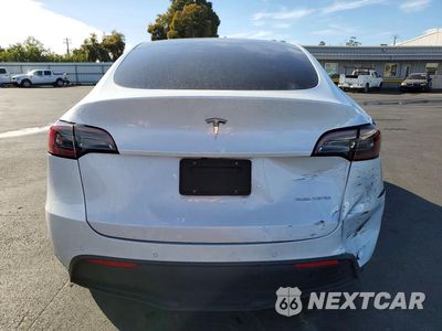 Zdjęcie 6 z 13 samochodu: 2022 TESLA MODEL Y VIN:7SAYGDEE7NF443655 - miniatura