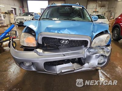 Piąte zdjęcie samochodu w środku: 2003 HYUNDAI SANTA FE GLS VIN:KM8SC13E63U529989 - miniatura