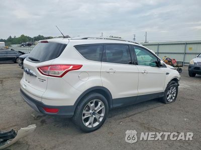 Trzecie zdjęcie samochodu z tyłu: 2016 FORD ESCAPE TITANIUM VIN:1FMCU9J96GUB03103 - miniatura