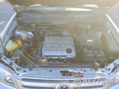 Zdjęcie 12 z 13 samochodu: 2005 TOYOTA HIGHLANDER BASE VIN:JTEEP21A650102717 - miniatura