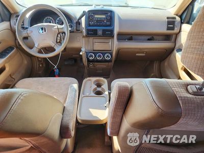 Zdjęcie 8 z 13 samochodu: 2004 HONDA CR-V LX VIN:JHLRD684X4C020673 - miniatura