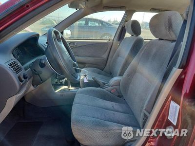 Zdjęcie 7 z 12 samochodu: 2000 TOYOTA COROLLA VIN:1NXBR12E3YZ367908 - miniatura