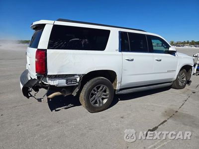 Trzecie zdjęcie samochodu z tyłu: 2018 CHEVROLET SUBURBAN K1500 LT VIN:1GNSKHKC1JR370015 - miniatura