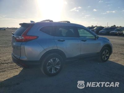Trzecie zdjęcie samochodu z tyłu: 2018 HONDA CR-V LX VIN:2HKRW6H34JH218020 - miniatura