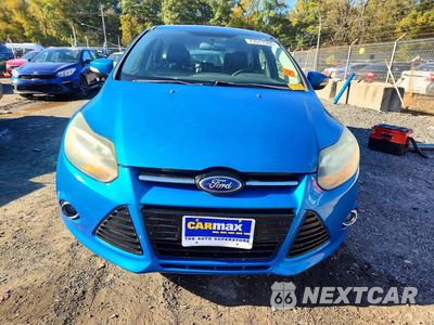 Piąte zdjęcie samochodu w środku: 2014 FORD FOCUS TITANIUM VIN:1FADP3N22EL338603 - miniatura