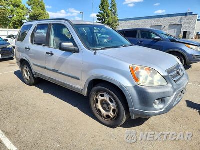 Czwarte zdjęcie samochodu z boku: 2006 HONDA CR-V LX VIN:JHLRD68536C018405 - miniatura