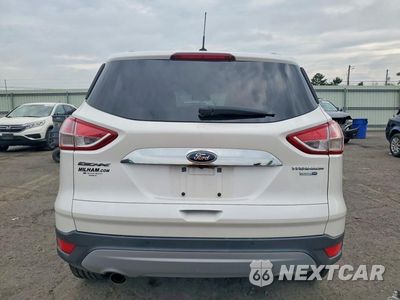 Zdjęcie 6 z 14 samochodu: 2016 FORD ESCAPE TITANIUM VIN:1FMCU9J96GUB03103 - miniatura