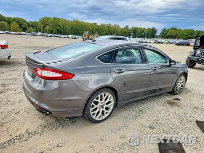 Trzecie zdjęcie samochodu z tyłu: 2014 FORD FUSION TITANIUM VIN:3FA6P0K9XER110617 - miniatura