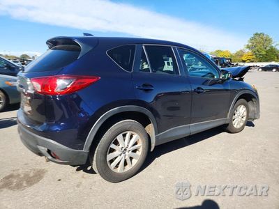 Trzecie zdjęcie samochodu z tyłu: 2014 MAZDA CX-5 TOURING VIN:JM3KE2CY1E0370198 - miniatura