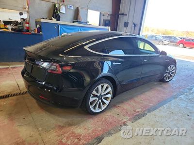 Trzecie zdjęcie samochodu z tyłu: 2019 TESLA MODEL 3 VIN:5YJ3E1EA1KF300642 - miniatura