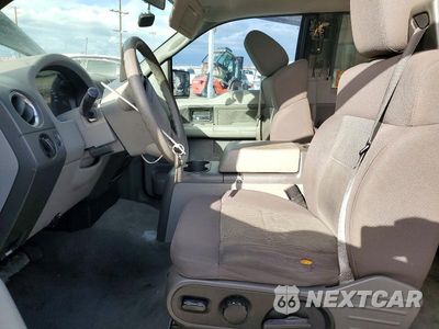 Zdjęcie 7 z 13 samochodu: 2004 FORD F150 VIN:1FTPX12574NA56454 - miniatura