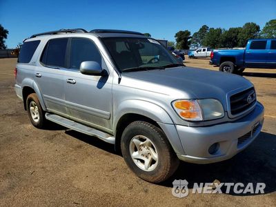 Czwarte zdjęcie samochodu z boku: 2001 TOYOTA SEQUOIA SR5 VIN:5TDBT44A31S006769 - miniatura
