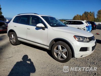 Czwarte zdjęcie samochodu z boku: 2014 VOLKSWAGEN TOUAREG V6 TDI VIN:WVGEP9BP0ED010281 - miniatura