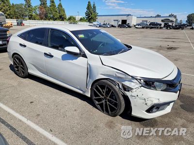 Czwarte zdjęcie samochodu z boku: 2020 HONDA CIVIC SPORT VIN:2HGFC2F8XLH524851 - miniatura