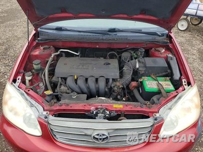 Zdjęcie 11 z 12 samochodu: 2004 TOYOTA COROLLA LE VIN:JTDBR32E142041207 - miniatura