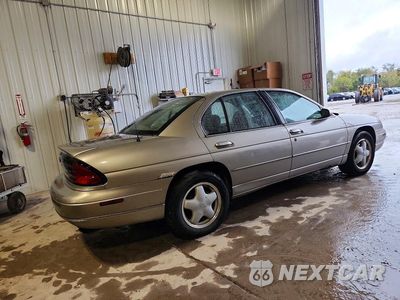 Trzecie zdjęcie samochodu z tyłu: 1999 CHEVROLET LUMINA LTZ VIN:2G1WN52K0X9122051 - miniatura