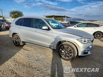 Czwarte zdjęcie samochodu z boku: 2017 BMW X5 XDR40E VIN:5UXKT0C51H0S80643 - miniatura