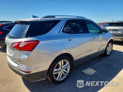Trzecie zdjęcie samochodu z tyłu: 2018 CHEVROLET EQUINOX PREMIER VIN:3GNAXNEX2JS638223 - miniatura