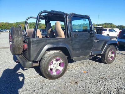 Trzecie zdjęcie samochodu z tyłu: 2000 JEEP WRANGLER / TJ SAHARA VIN:1J4FA59S4YP802394 - miniatura