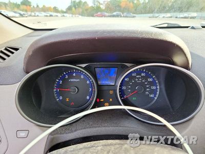 Zdjęcie 9 z 13 samochodu: 2012 HYUNDAI TUCSON LIMITED VIN:KM8JUCAC7CU381485 - miniatura