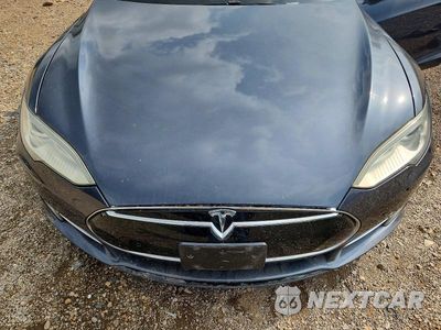 Zdjęcie 11 z 12 samochodu: 2014 TESLA MODEL S VIN:5YJSA1H21EFP63932 - miniatura