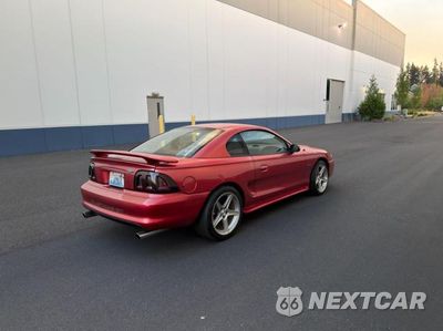 Czwarte zdjęcie samochodu z boku: 1996 FORD MUSTANG GT VIN:1FALP42XXTF190133 - miniatura