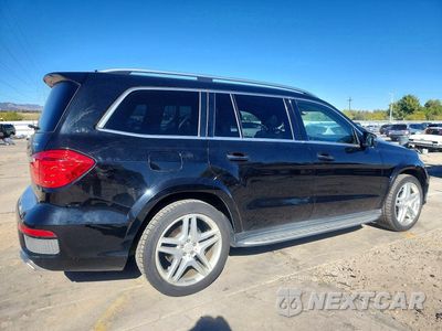 Trzecie zdjęcie samochodu z tyłu: 2014 MERCEDES-BENZ GL 550 4MATIC VIN:4JGDF7DE8EA300221 - miniatura