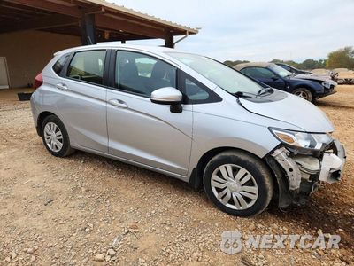 Czwarte zdjęcie samochodu z boku: 2016 HONDA FIT LX VIN:JHMGK5H52GS008622 - miniatura