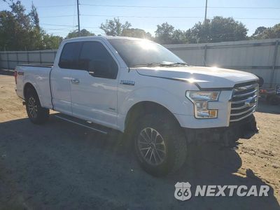 Czwarte zdjęcie samochodu z boku: 2015 FORD F150 SUPER CAB VIN:1FTEX1EP3FFC29176 - miniatura