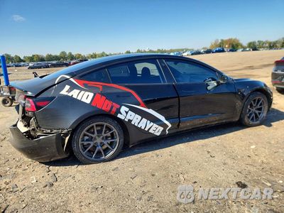 Trzecie zdjęcie samochodu z tyłu: 2019 TESLA MODEL 3 VIN:5YJ3E1EA9KF361818 - miniatura