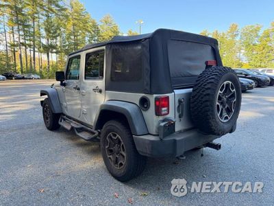 Trzecie zdjęcie samochodu z tyłu: 2010 JEEP WRANGLER UNLIMITED SPORT VIN:1J4BB3H11AL142174 - miniatura