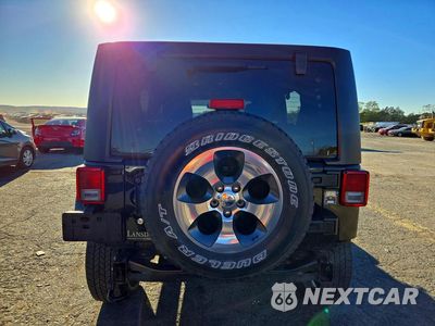 Zdjęcie 6 z 13 samochodu: 2018 JEEP WRANGLER UNLIMITED SAHARA VIN:1C4BJWEG7JL937359 - miniatura