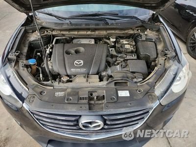 Zdjęcie 11 z 13 samochodu: 2016 MAZDA CX-5 TOURING VIN:JM3KE2CY8G0726472 - miniatura
