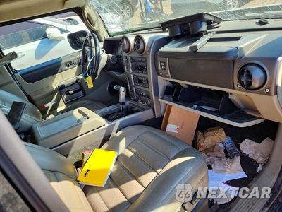 Zdjęcie 8 z 14 samochodu: 2004 HUMMER H2 VIN:5GRGN23U04H114421 - miniatura