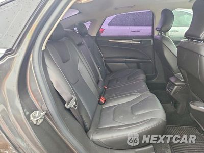 Zdjęcie 10 z 12 samochodu: 2016 FORD FUSION TITANIUM VIN:3FA6P0K98GR273379 - miniatura