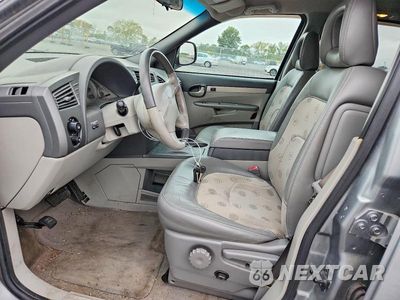 Zdjęcie 7 z 13 samochodu: 2003 BUICK RENDEZVOUS CX VIN:3G5DA03E03S580876 - miniatura