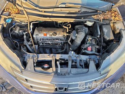 Zdjęcie 11 z 12 samochodu: 2013 HONDA CR-V EXL VIN:2HKRM4H7XDH610355 - miniatura
