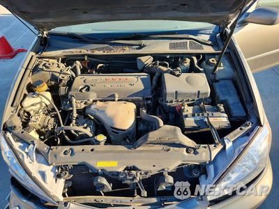 Zdjęcie 11 z 12 samochodu: 2003 TOYOTA CAMRY XLE VIN:4T1BE30KX3U685078 - miniatura