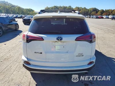 Zdjęcie 6 z 13 samochodu: 2018 TOYOTA RAV4 HYBRID XLE VIN:JTMRJREV4JD185001 - miniatura