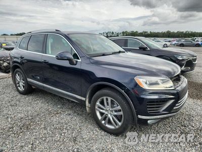 Czwarte zdjęcie samochodu z boku: 2015 VOLKSWAGEN TOUAREG V6 VIN:WVGEF9BP4FD007209 - miniatura
