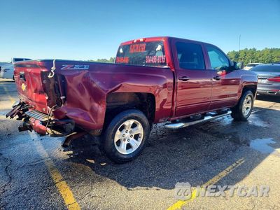 Trzecie zdjęcie samochodu z tyłu: 2016 CHEVROLET SILVERADO K1500 LT VIN:3GCUKREC1GG141183 - miniatura