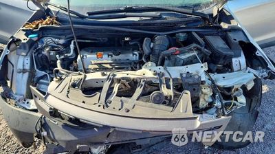Zdjęcie 12 z 13 samochodu: 2012 HONDA CR-V EX VIN:JHLRM4H59CC028503 - miniatura
