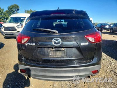 Zdjęcie 6 z 13 samochodu: 2013 MAZDA CX-5 TOURING VIN:JM3KE2CE4D0138926 - miniatura