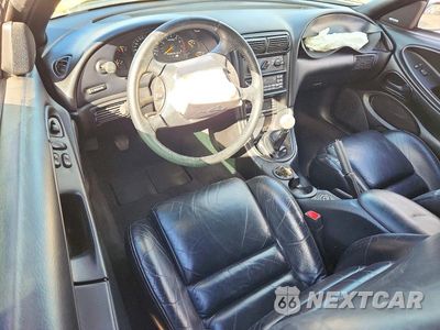 Zdjęcie 8 z 13 samochodu: 1998 FORD MUSTANG GT VIN:1FAFP42X7WF260589 - miniatura