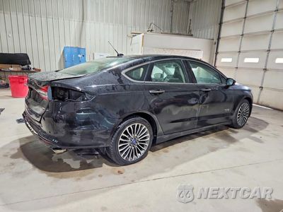 Trzecie zdjęcie samochodu z tyłu: 2017 FORD FUSION SE PHEV VIN:3FA6P0PU4HR198968 - miniatura