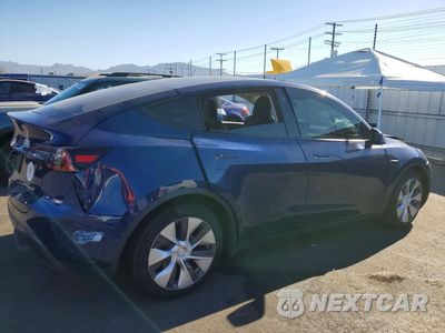Trzecie zdjęcie samochodu z tyłu: 2021 TESLA MODEL Y VIN:5YJYGDEE9MF148214 - miniatura